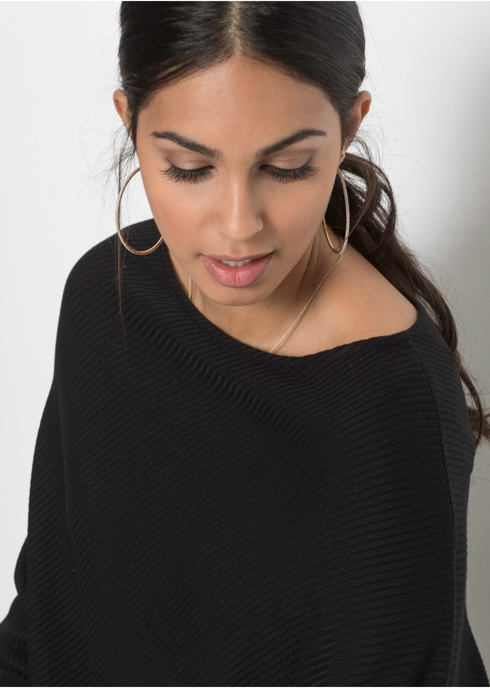 Pull oversize avec base asymétrique