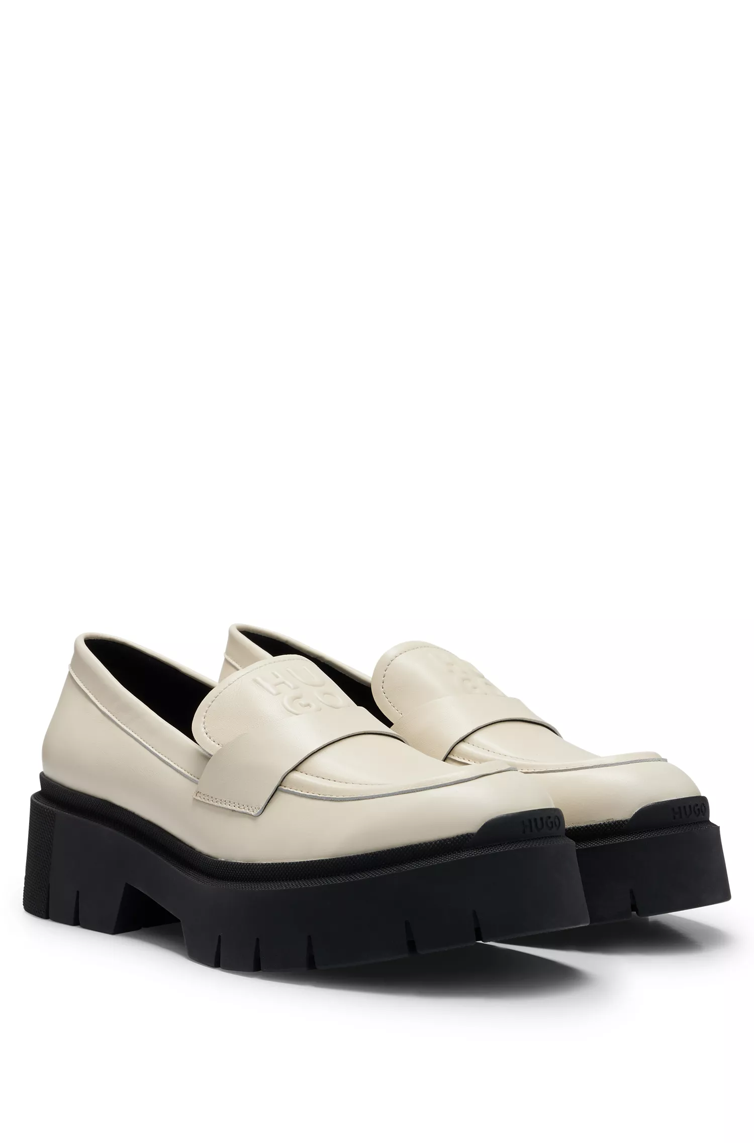 Mocassins HUGO vermelhos com sola grossa em couro liso com detalhes do logotipo.