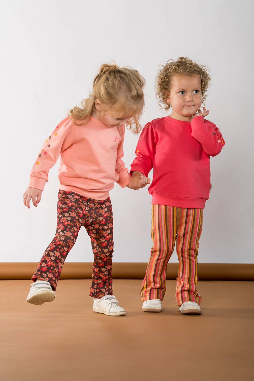 B.Nosy baby gestreepte high waist flared broek Petra roze/goud/geel