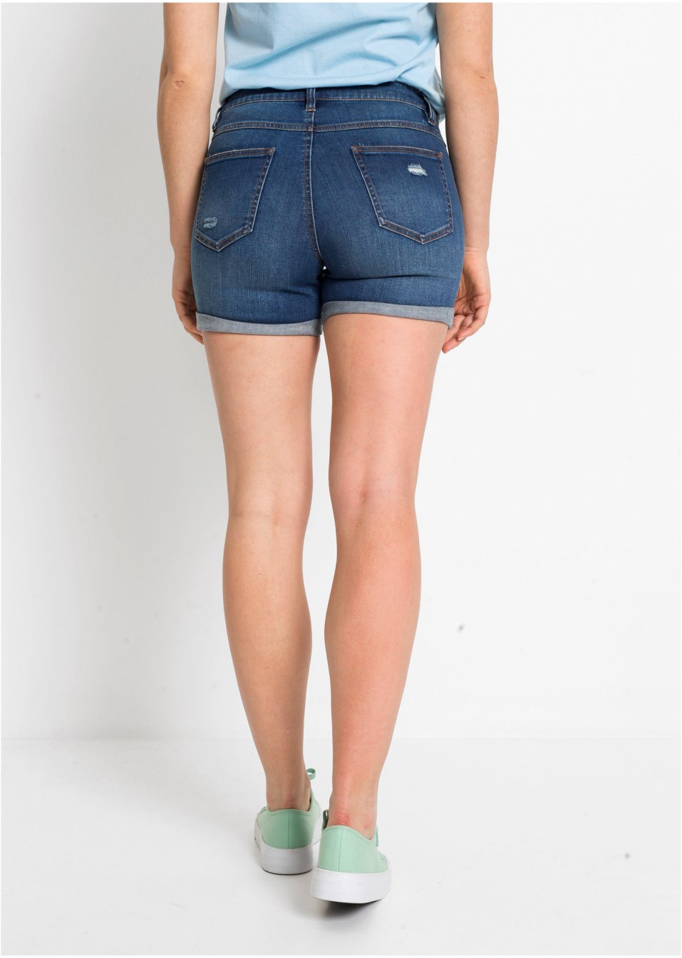 Short en jean à effets déchirés