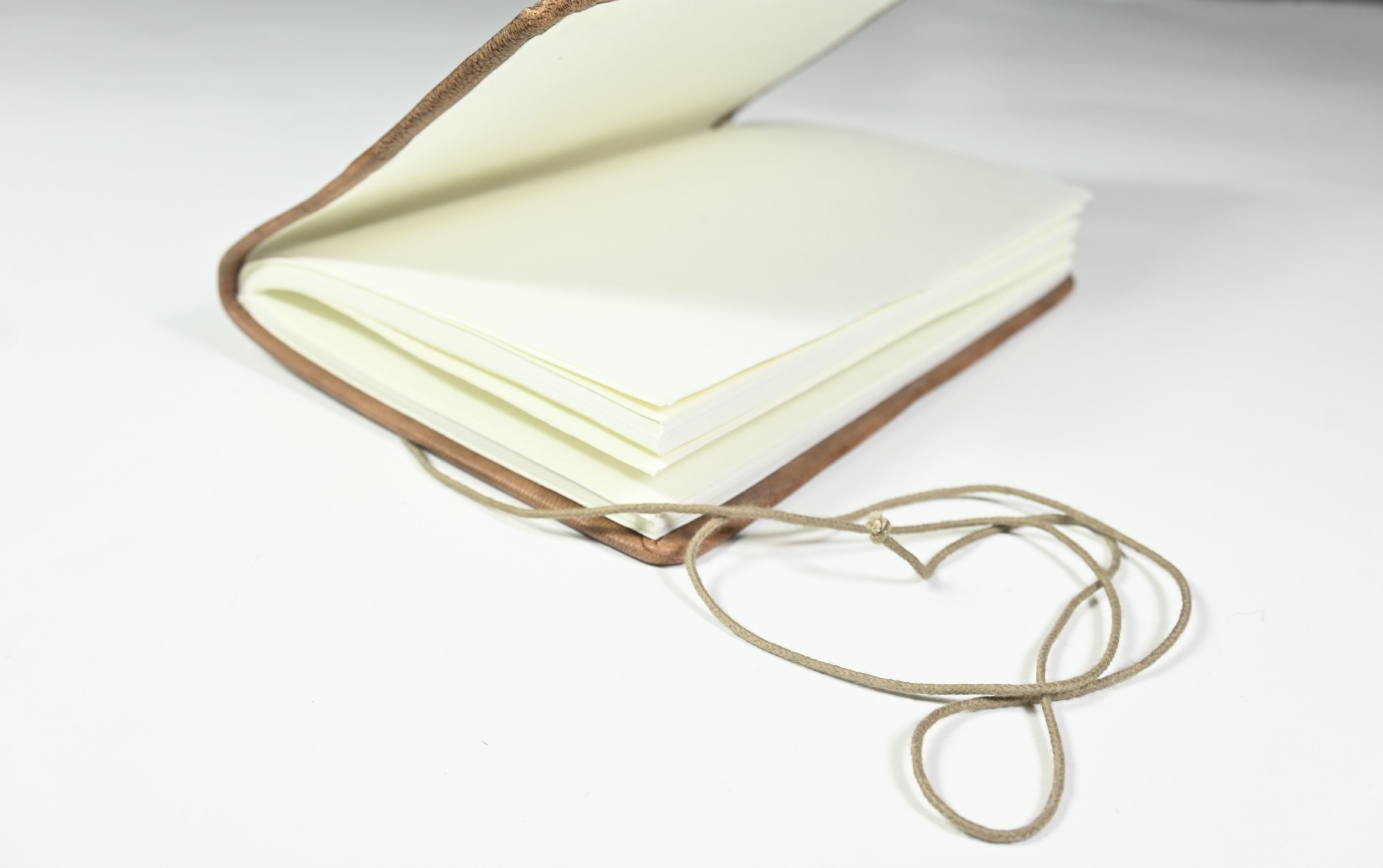 Notizbuch 'Unee groß' mit Ledereinband, braun, H 20 cm, B 15 cm günstig bestellen