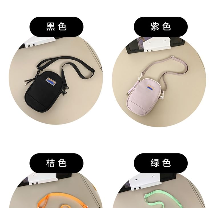 IOU - Nylon crossbodytas met applicaties