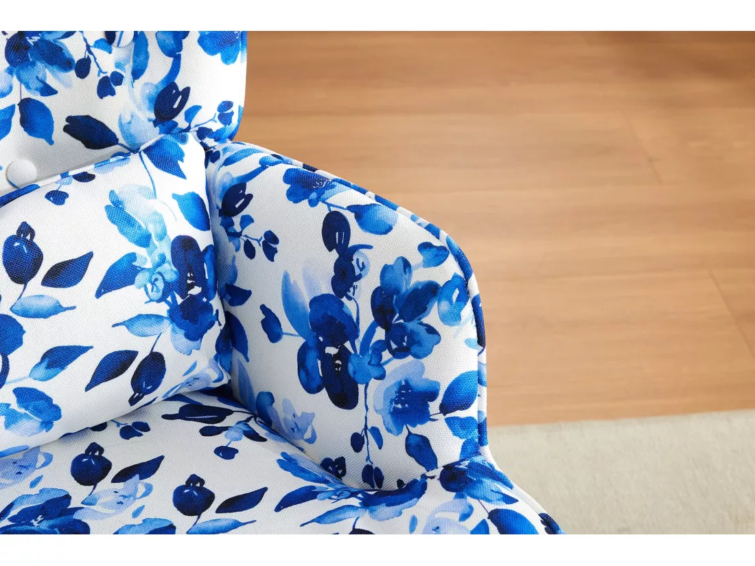 Fauteuil à bascule en velours élégant avec cadre métallique et base en bois pour une chambre sophistiquée