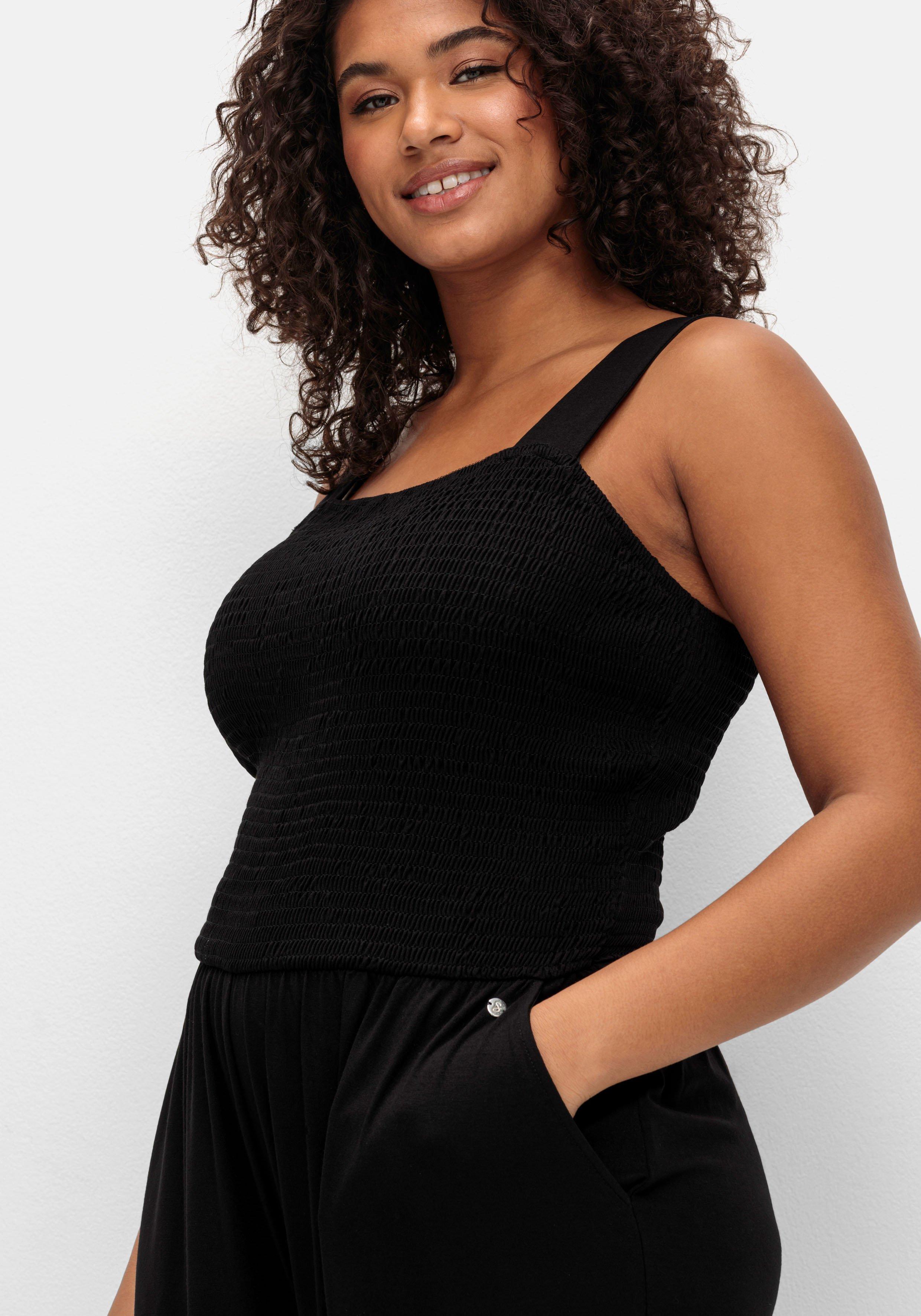 Jumpsuit mit Smok-Oberteil und weitem Bein