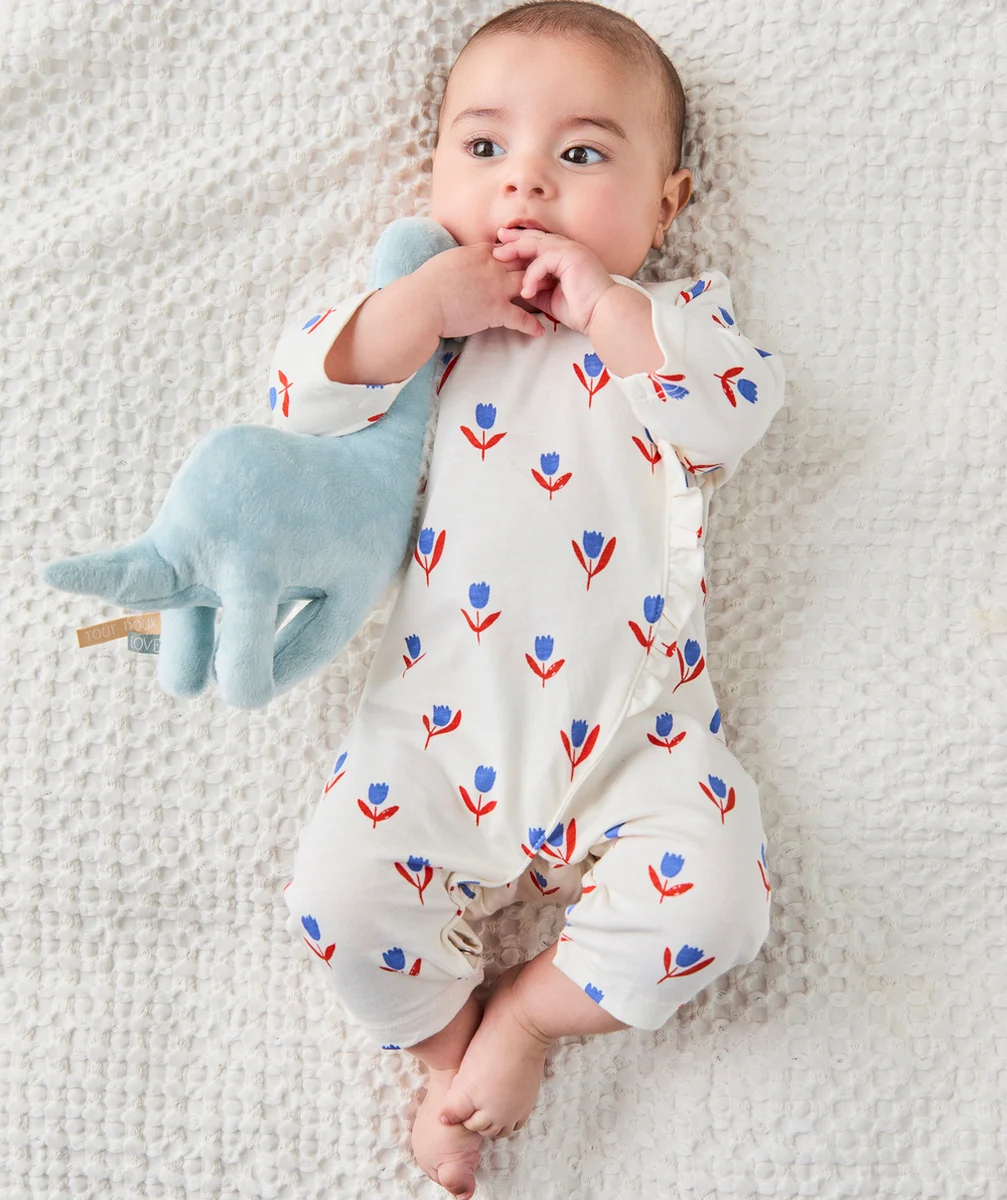 dors bien bébé en coton bio blanc imprimé avec fleurs bleu et rouge