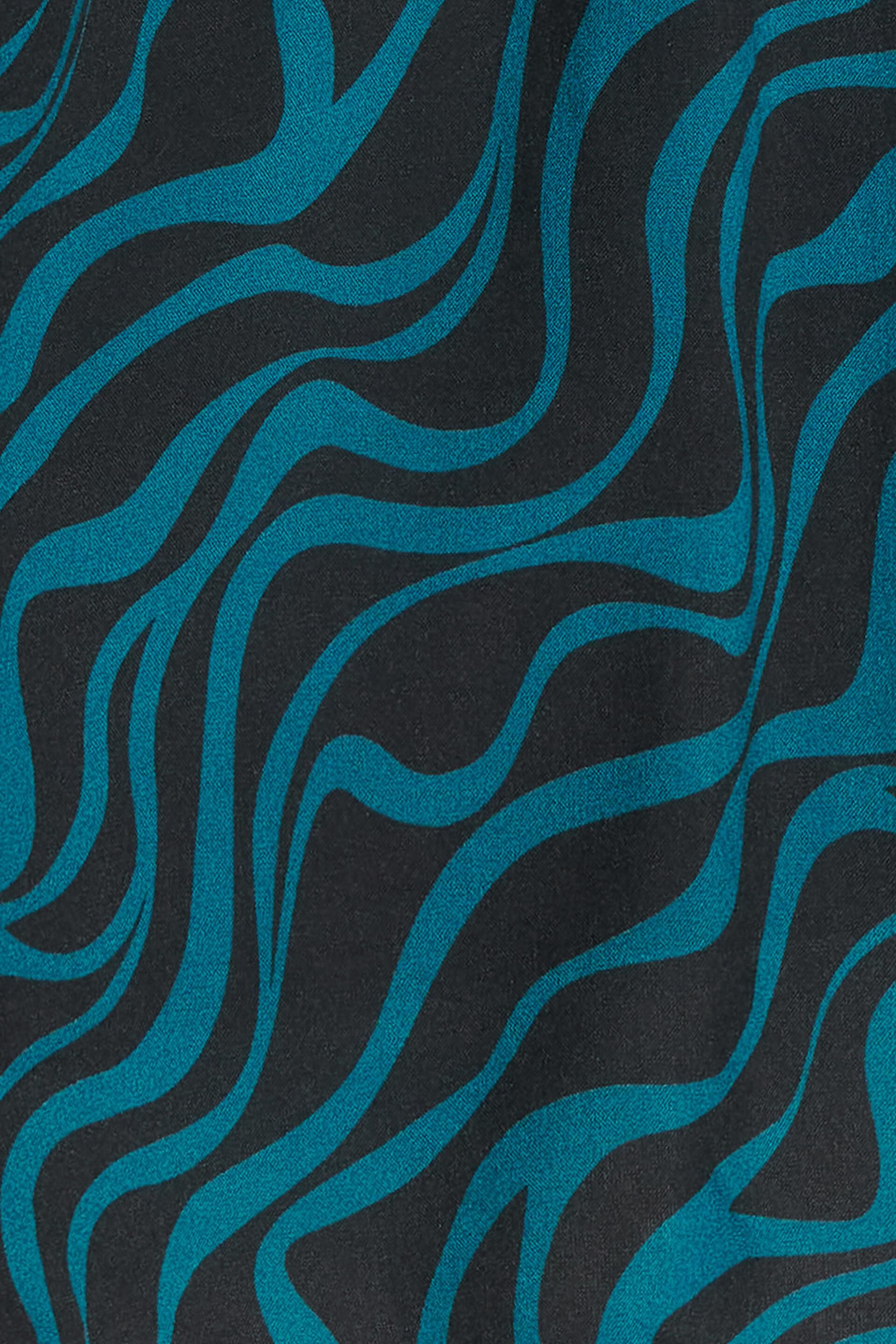 Blouse à col droit animée d’un motif