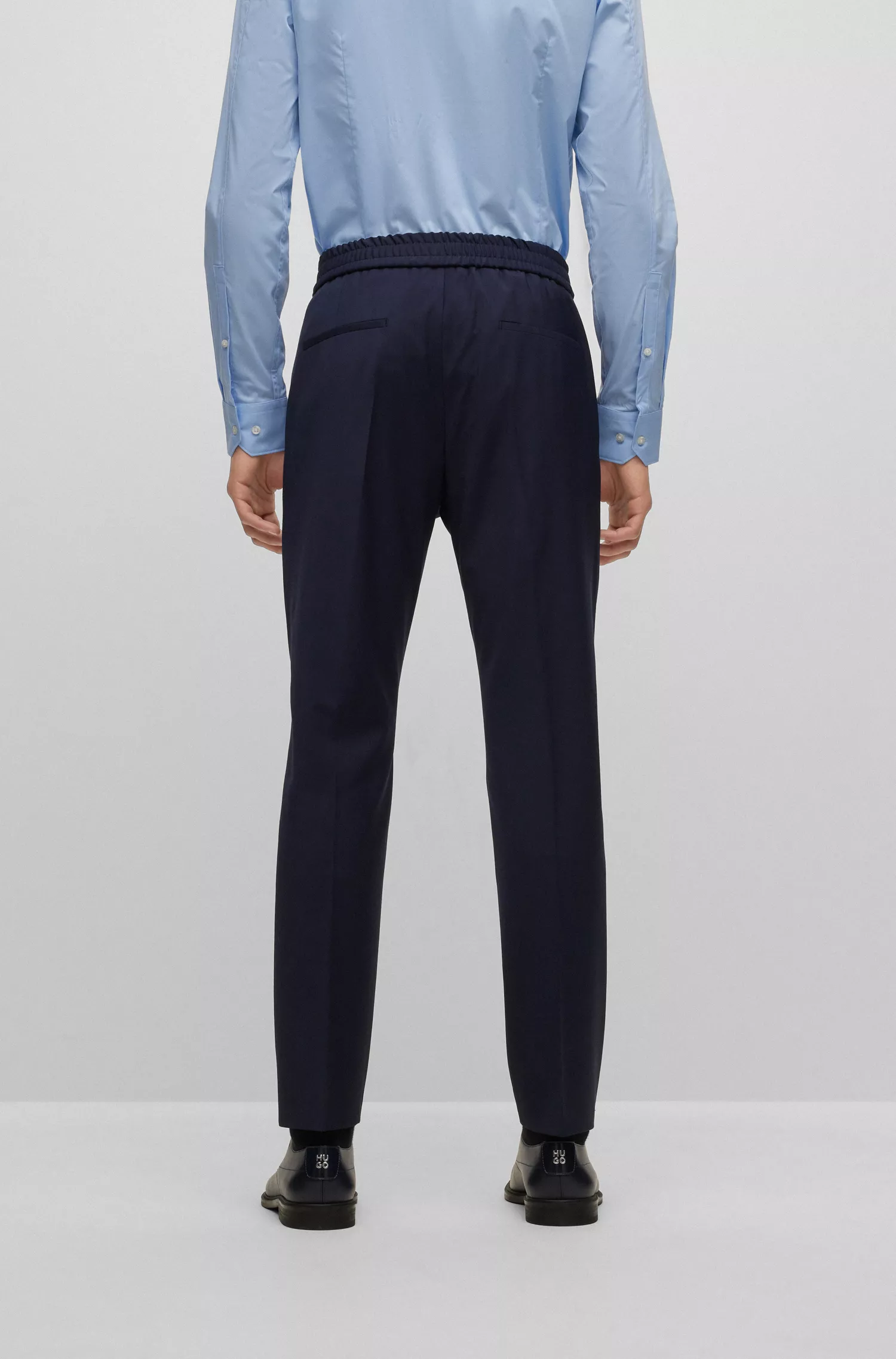 Calças HUGO vermelhas, extra slim fit, em mistura de lã super flexível.