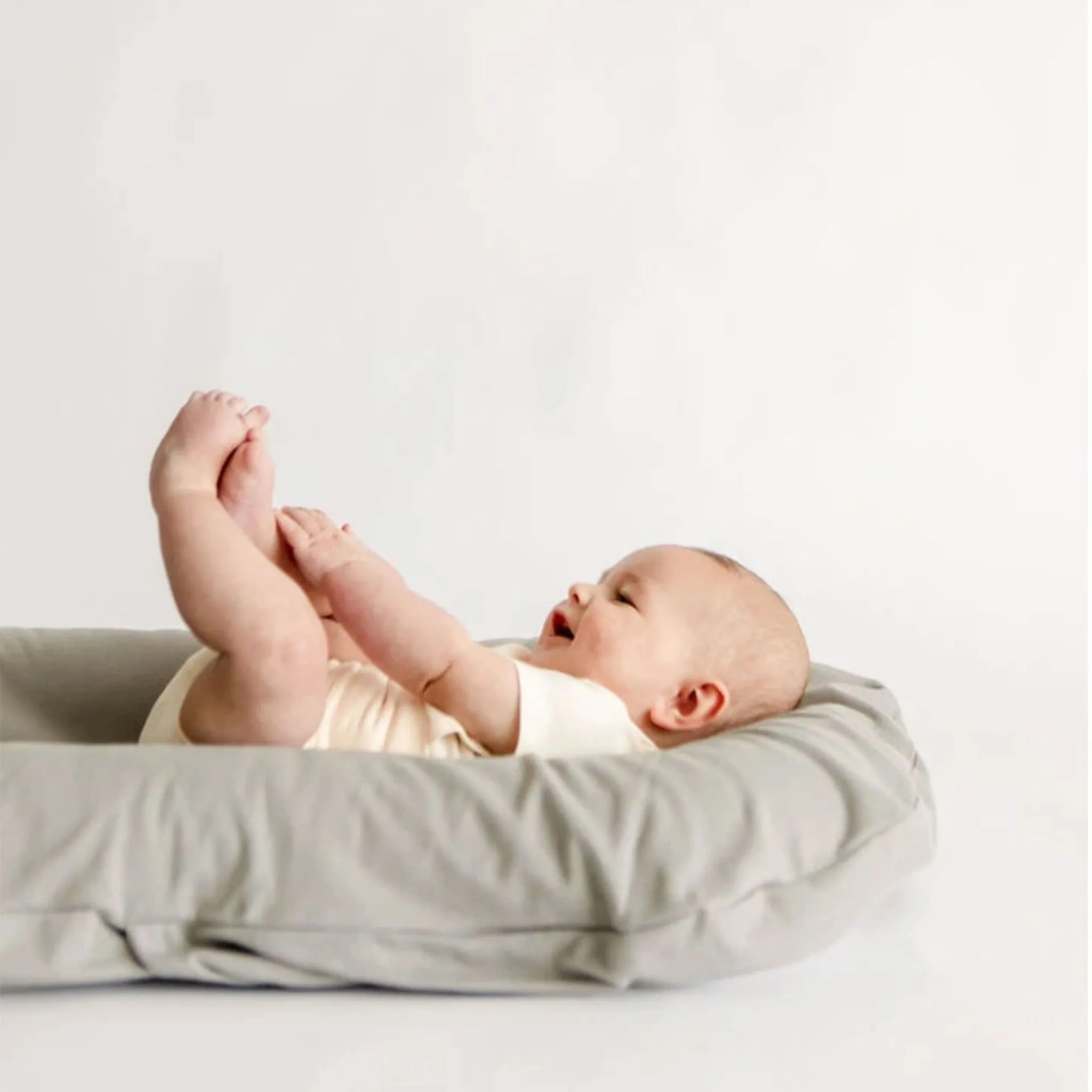Snuggle me Housse pour Coussin Snuggle Me - Stone