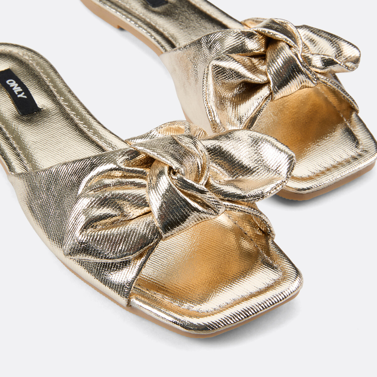 SOMENTE SAPATOS<br>Mules cruzadas Minnie