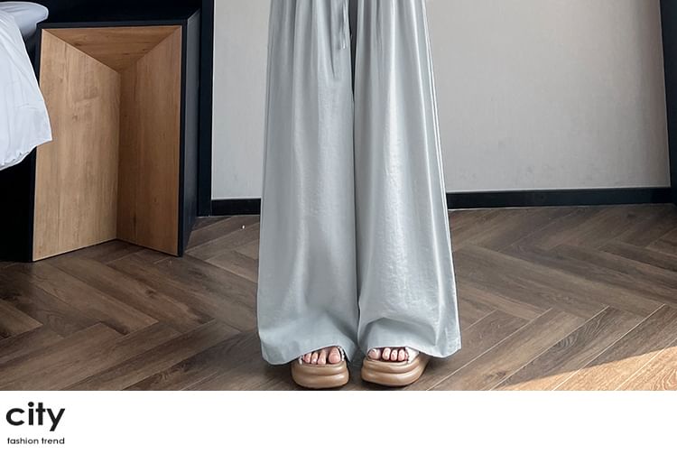 Tel tot 10 - Effen broek met wijde pijpen en trekkoord in de taille (verschillende ontwerpen)