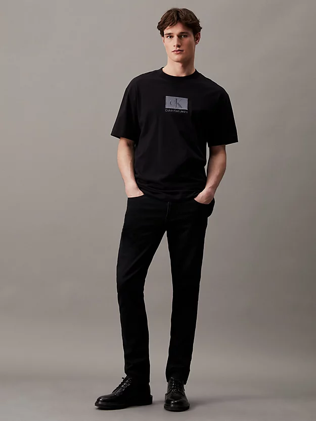 Camiseta de corte folgado com brasão
