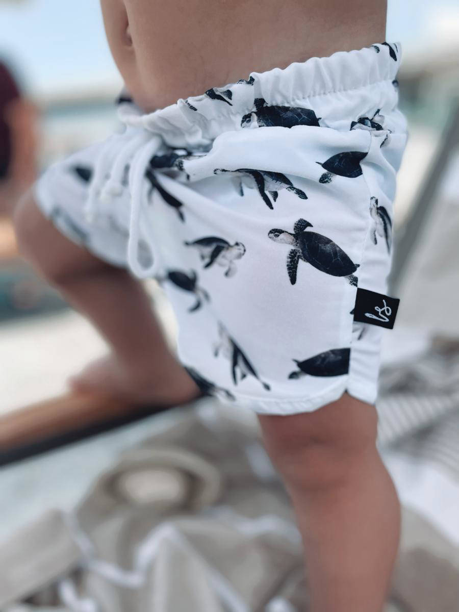 Babystyling zwemshort wit/zwart