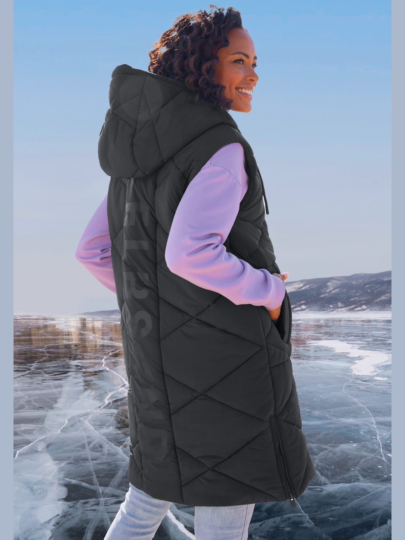 Gilet matelassé doublé avec capuche réglable