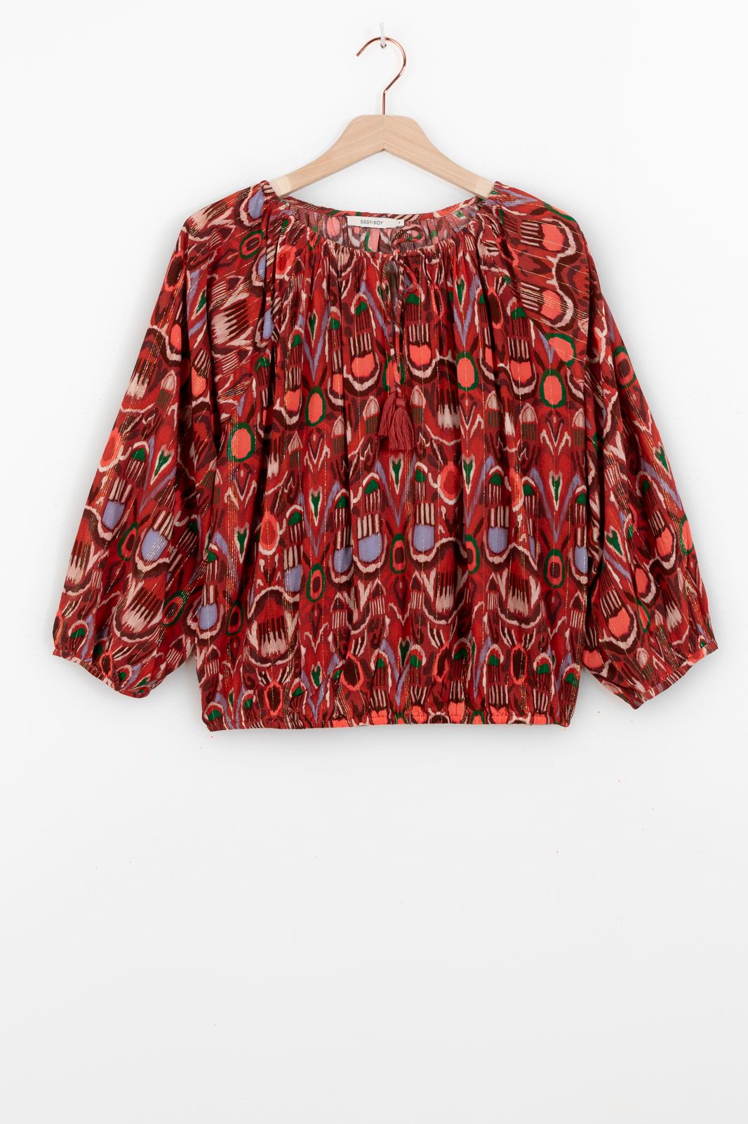 Donkerrode top met ikat print