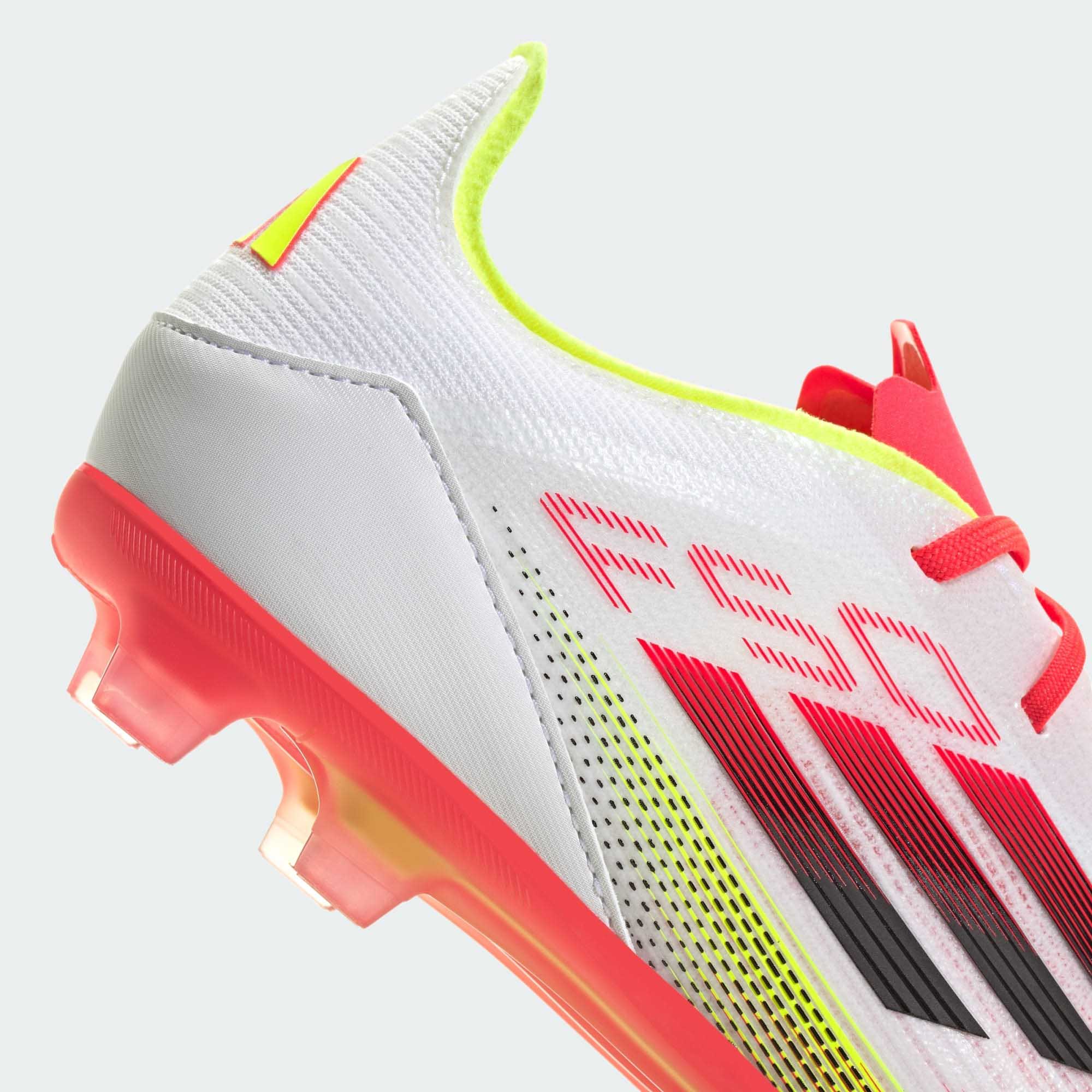 F50 Elite FG Junior Cloud White/Core Black/Solar Yellow