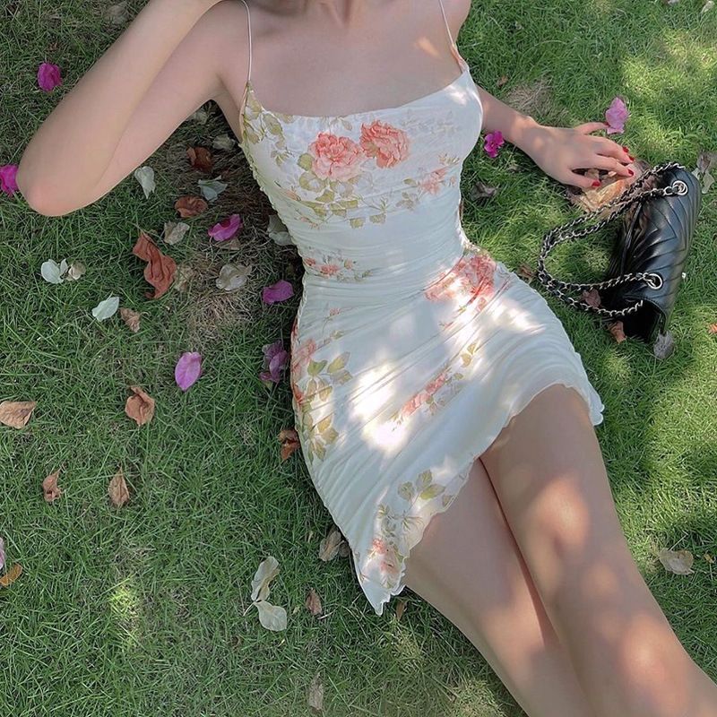 Rosesand - Mini-bodyconjurk met spaghettibandjes en bloemenprint van mesh