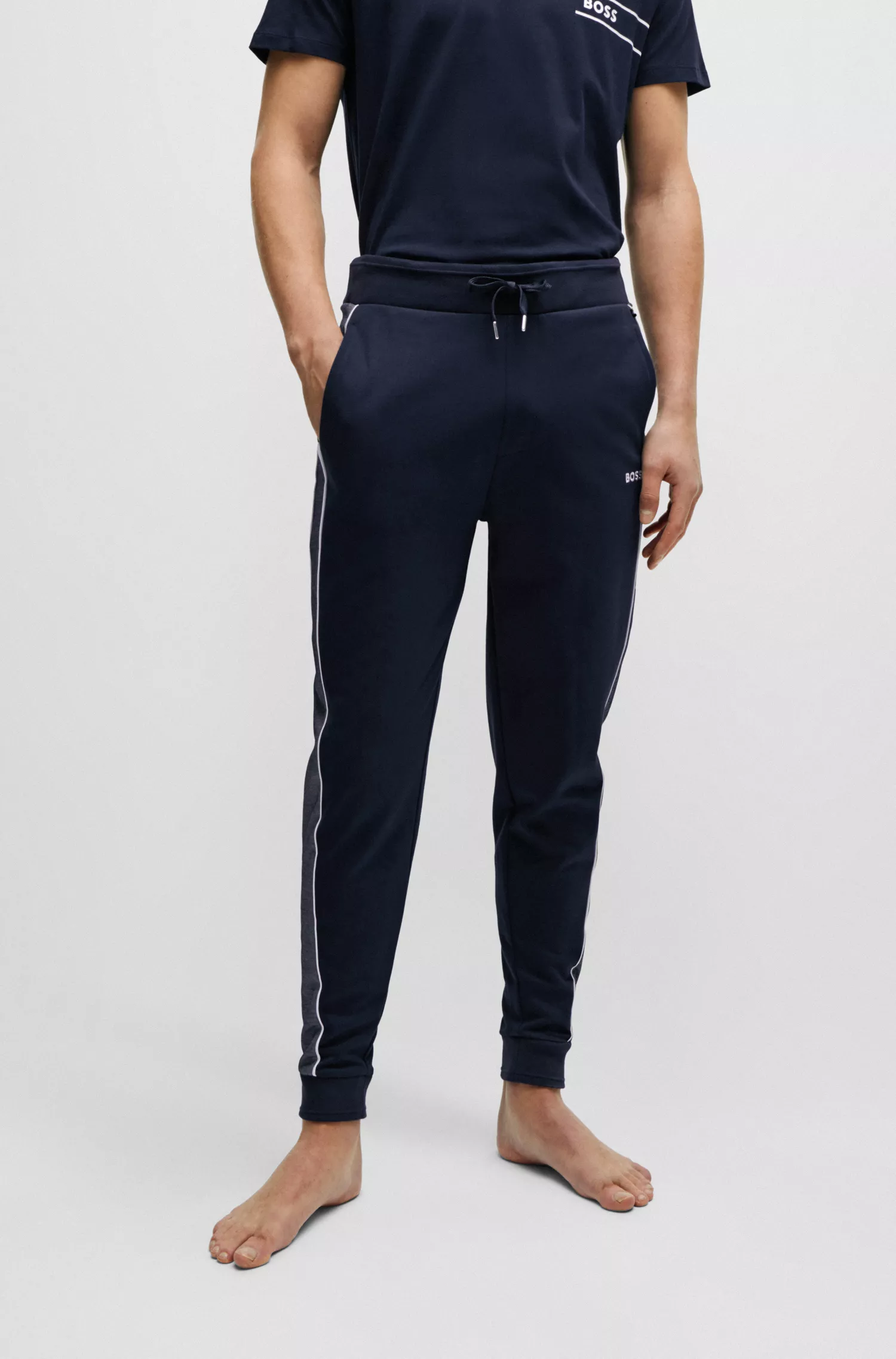 Calça de fato de treino BOSS em mistura de algodão preto com logótipo bordado