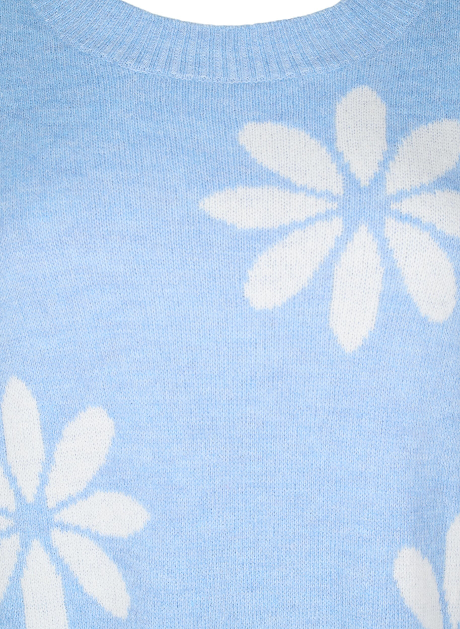 Strikbluse med blomster