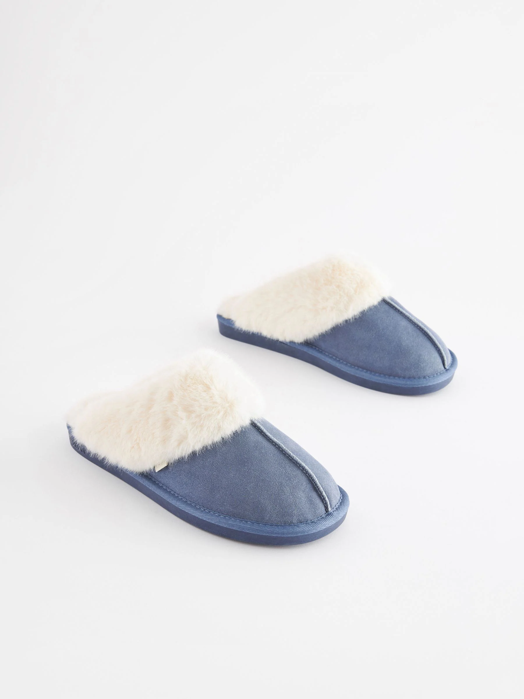 Denimblauw - Suède muiltjes met voering van imitatiebont
