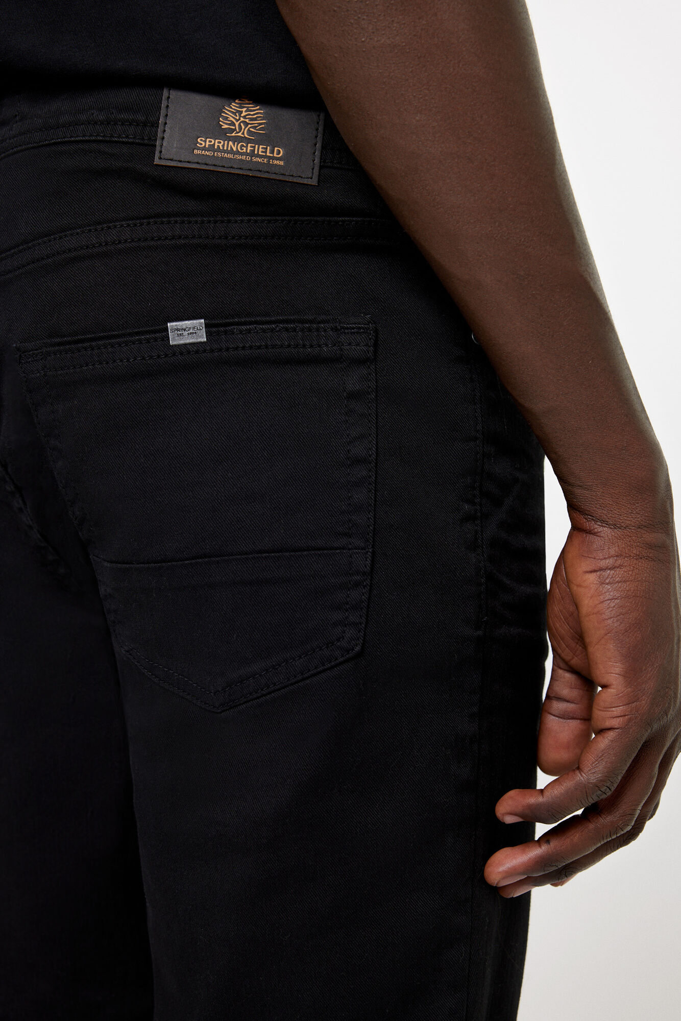 Calça skinny de cinco bolsos
