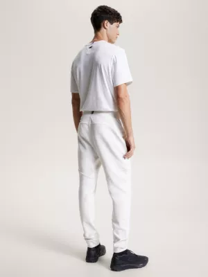 Calça de moletom esportiva essencial com logo tonal e punhos canelados
