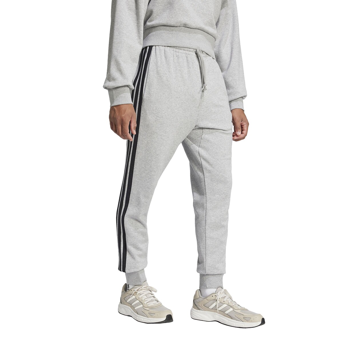 ADIDAS ROUPAS ESPORTIVAS<br>Calças Trag com 3 listras Essencial