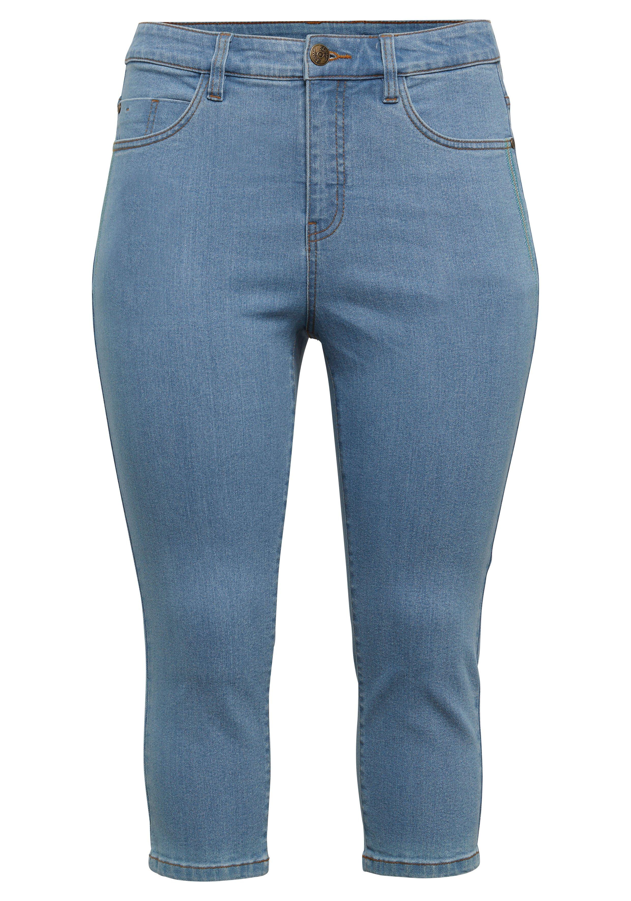 Caprijeans mit Catfaces und Kontrastnähten
