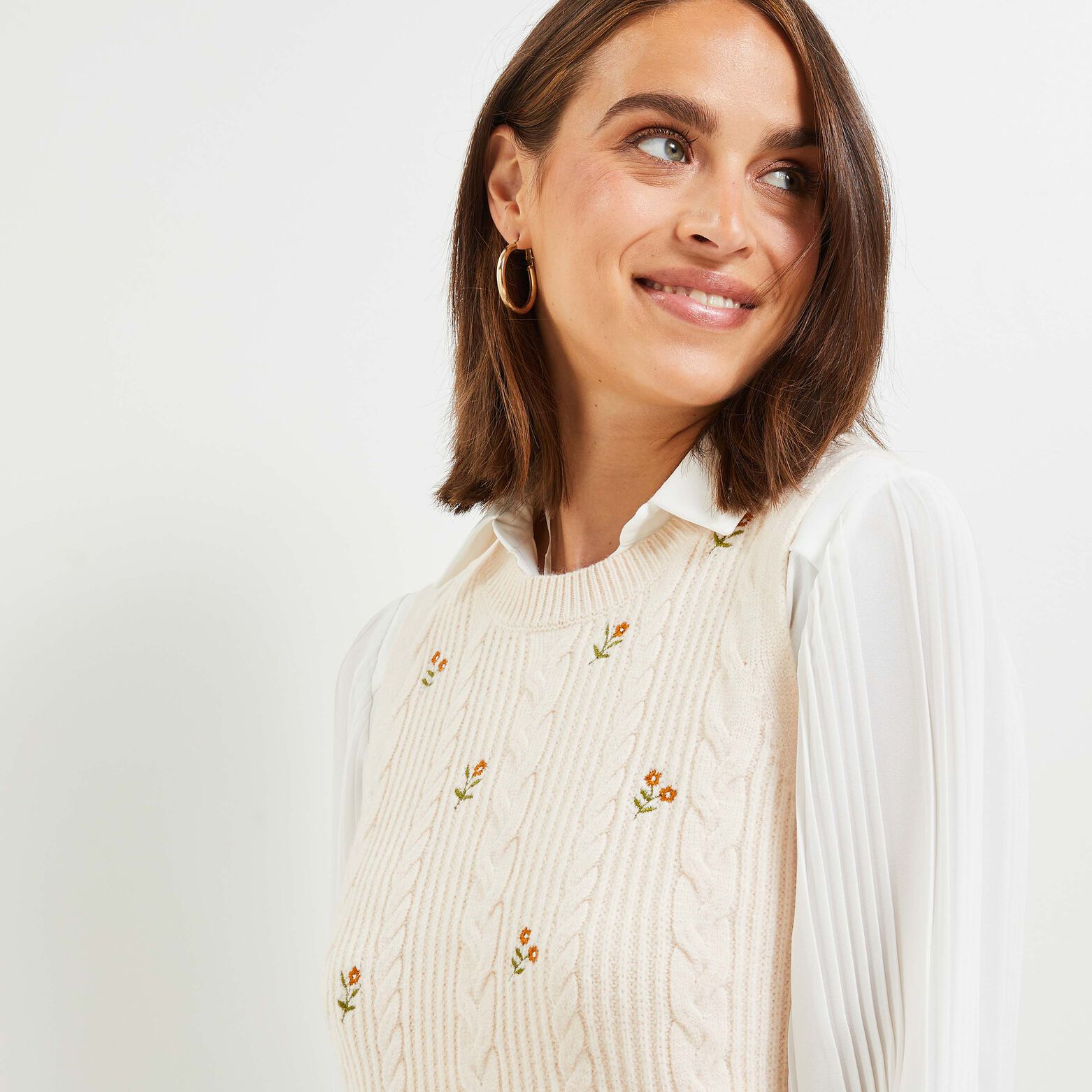 Pull sans manches broderie femme