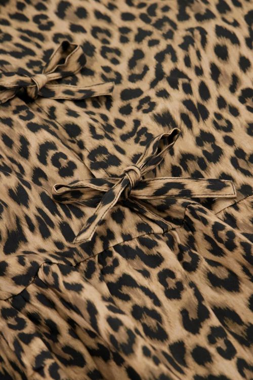Panter top met strikjes en pofmouwen