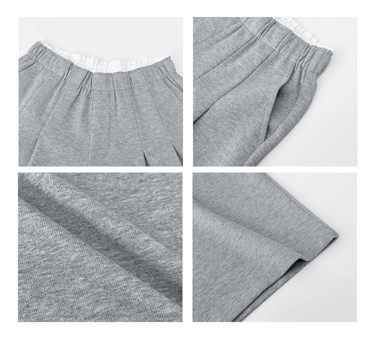 Shira - Wijde joggingbroek met geplooide taille en detail in 5 kleuren