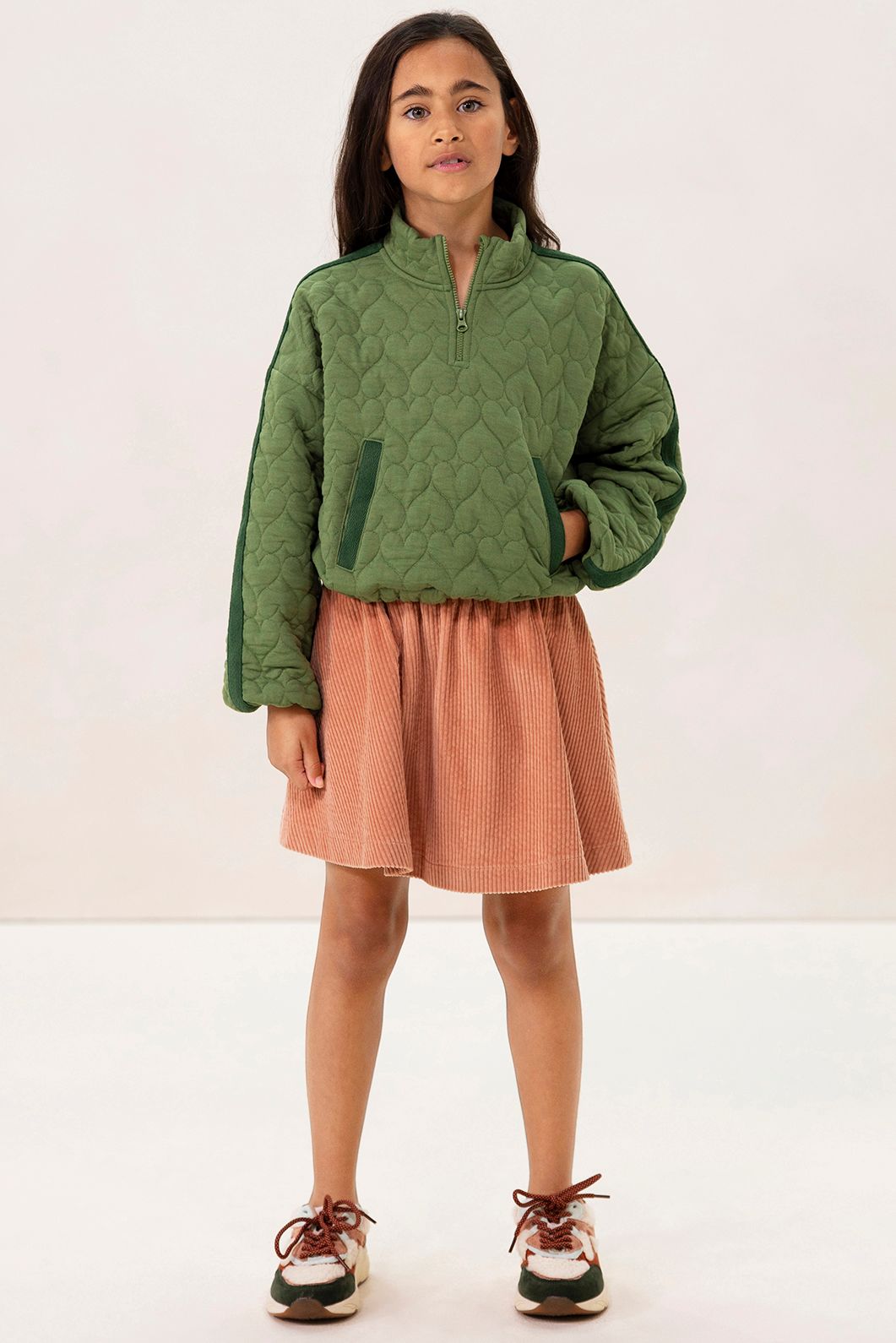 Groene sweater met hartjes quilting