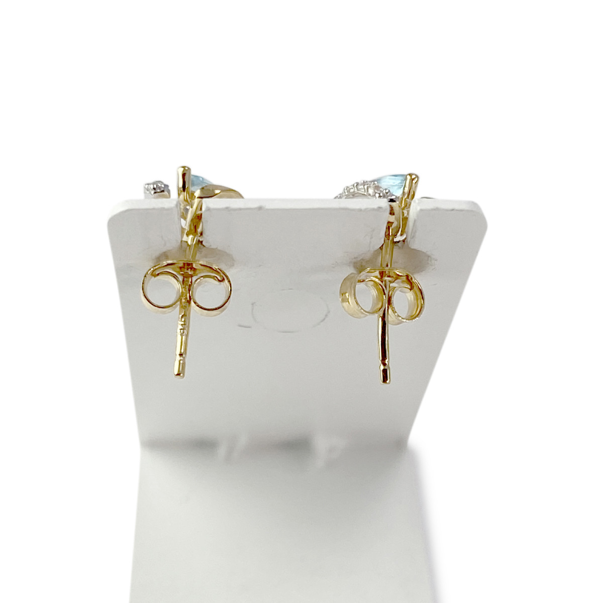 Boucles d'oreilles d'occasion or 375 jaune et rhodié topaze zirconias