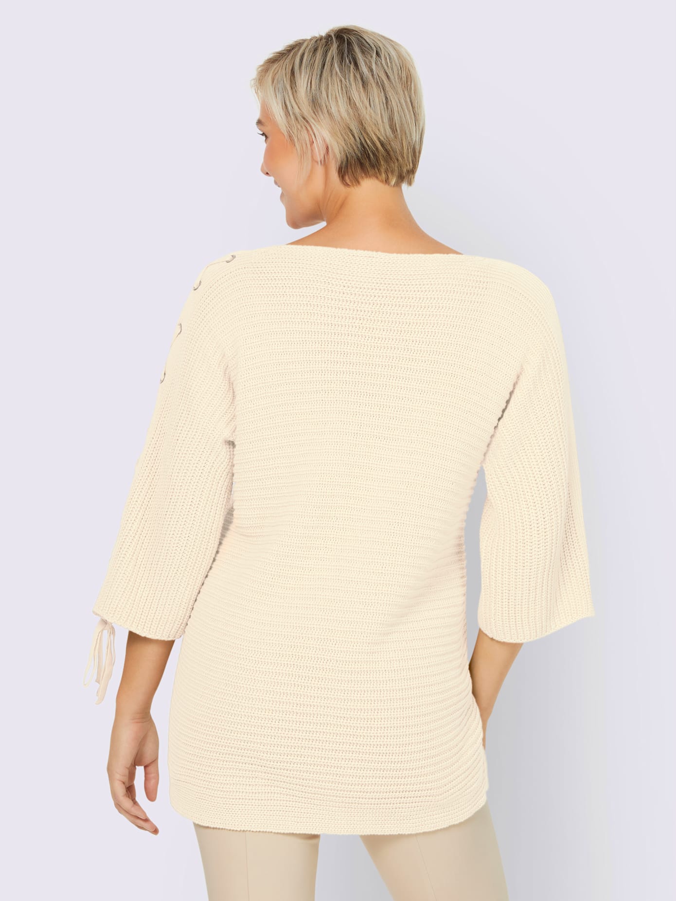 Pull laçage mode aux manches