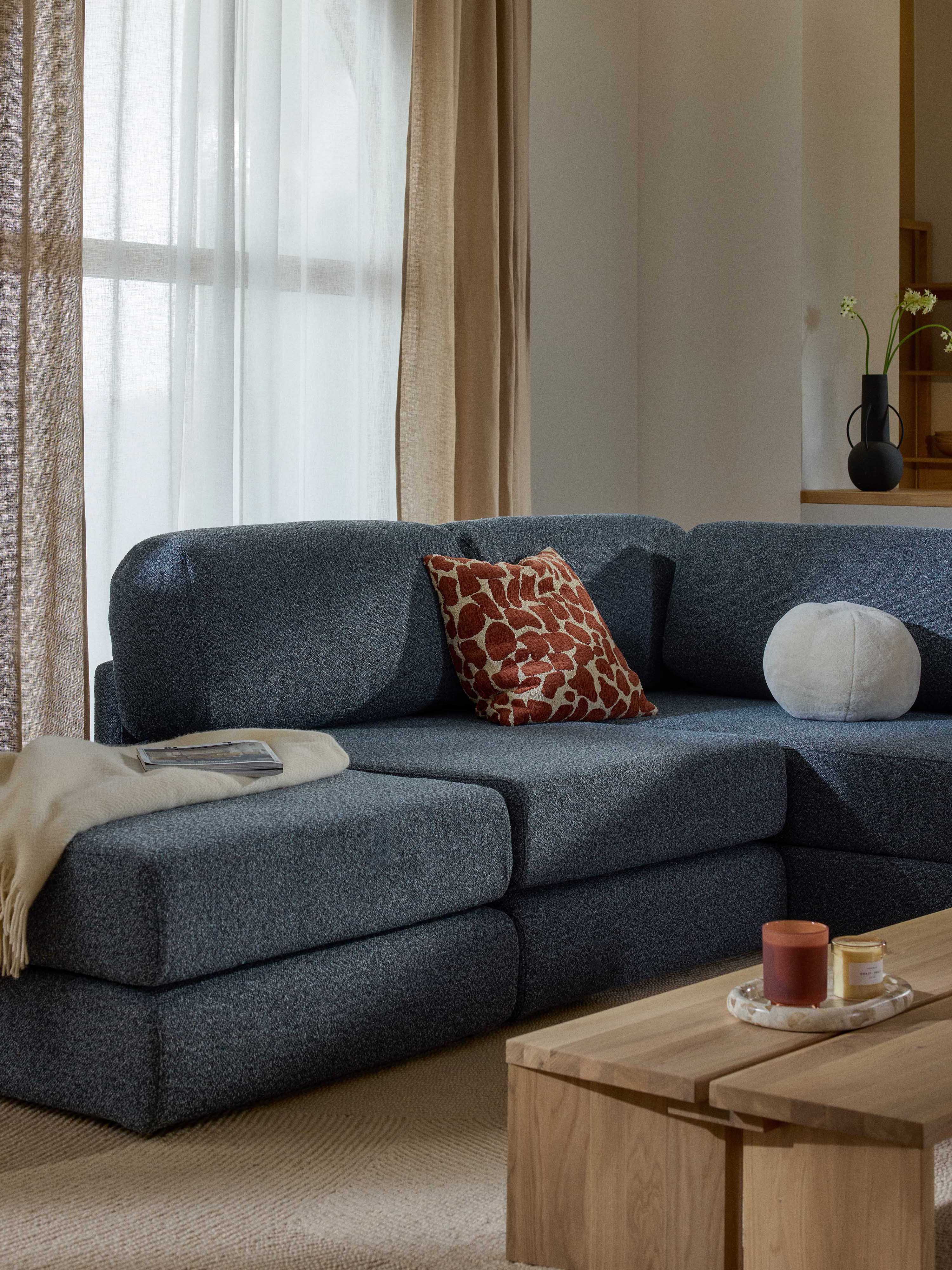 Bouclé hoekbankbed Ladina met opbergruimte