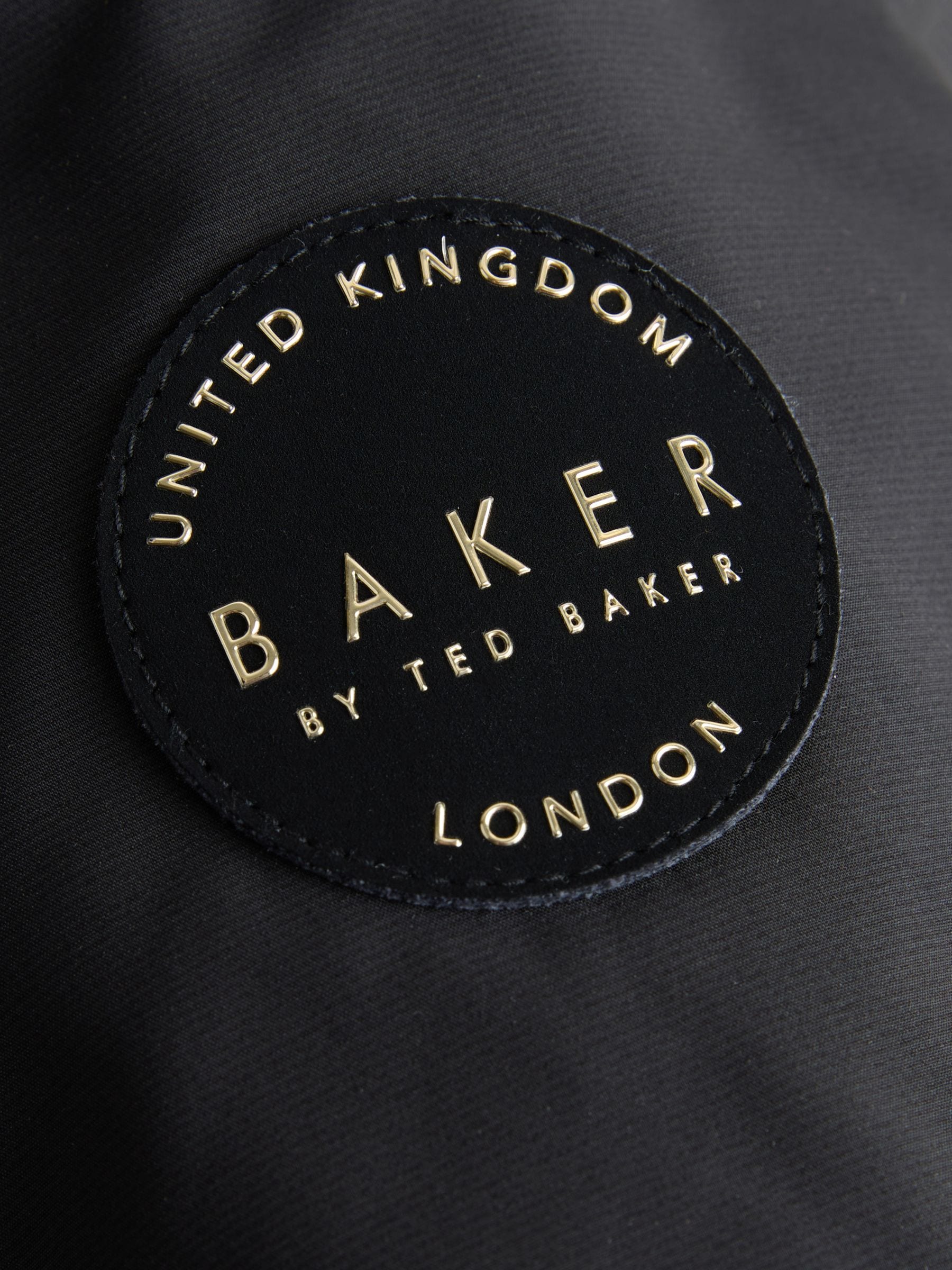 Baker by Ted Baker - Regenbestendige zwarte parka met rok