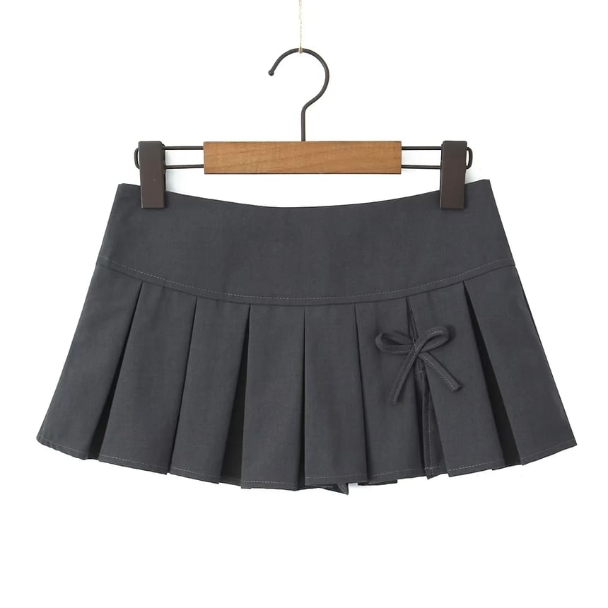 Omelia - Lage taille effen strik accent geplooide split mini A-lijn rok