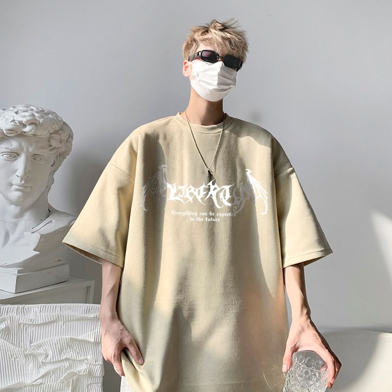 Bay Go Mall - T-shirt met korte mouwen, ronde hals en bloemenprint in krantenstijl