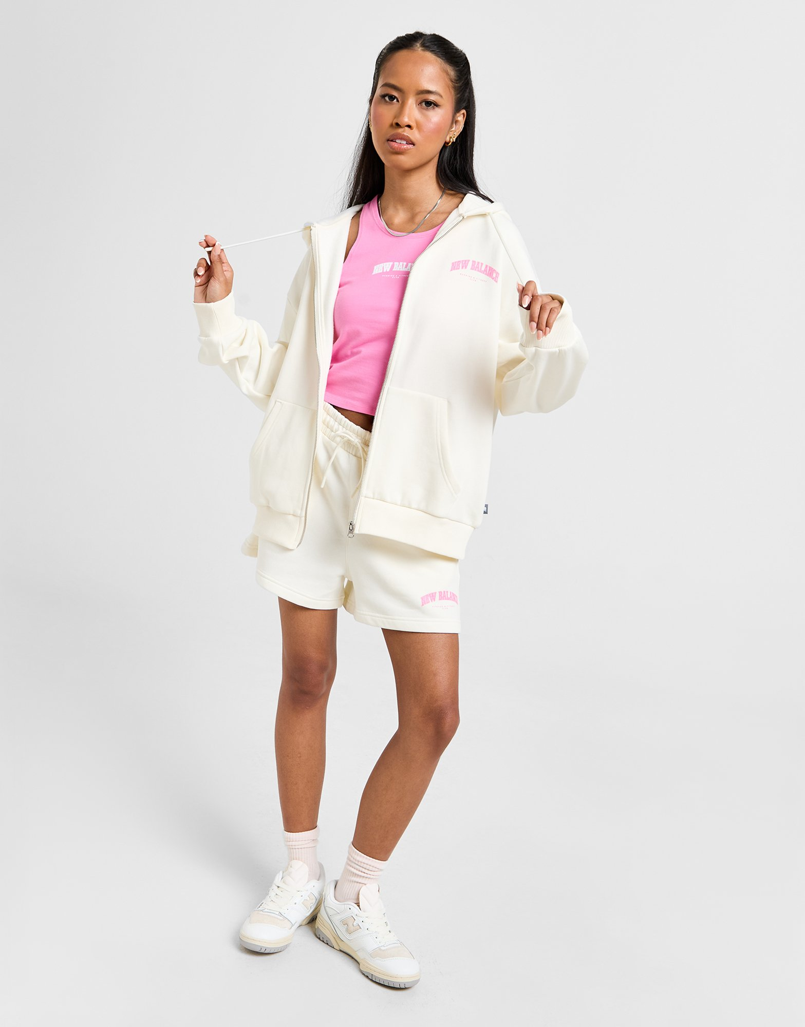 New Balance Sweat à Capuche Zippé Logo Femme