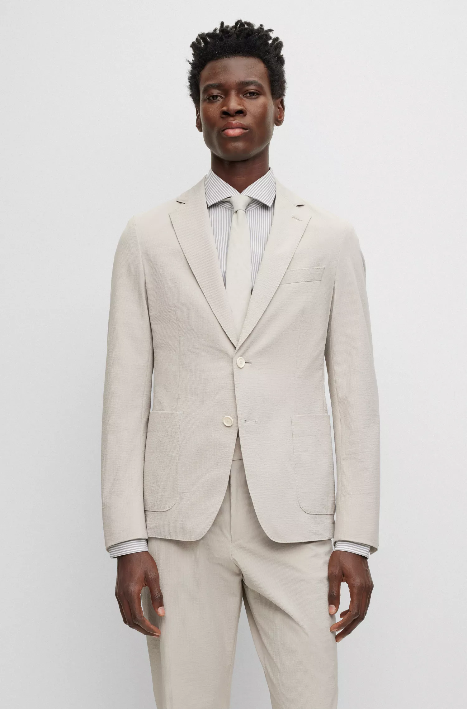 Terno slim fit preto da BOSS em tecido elástico de alta performance com microestampa.