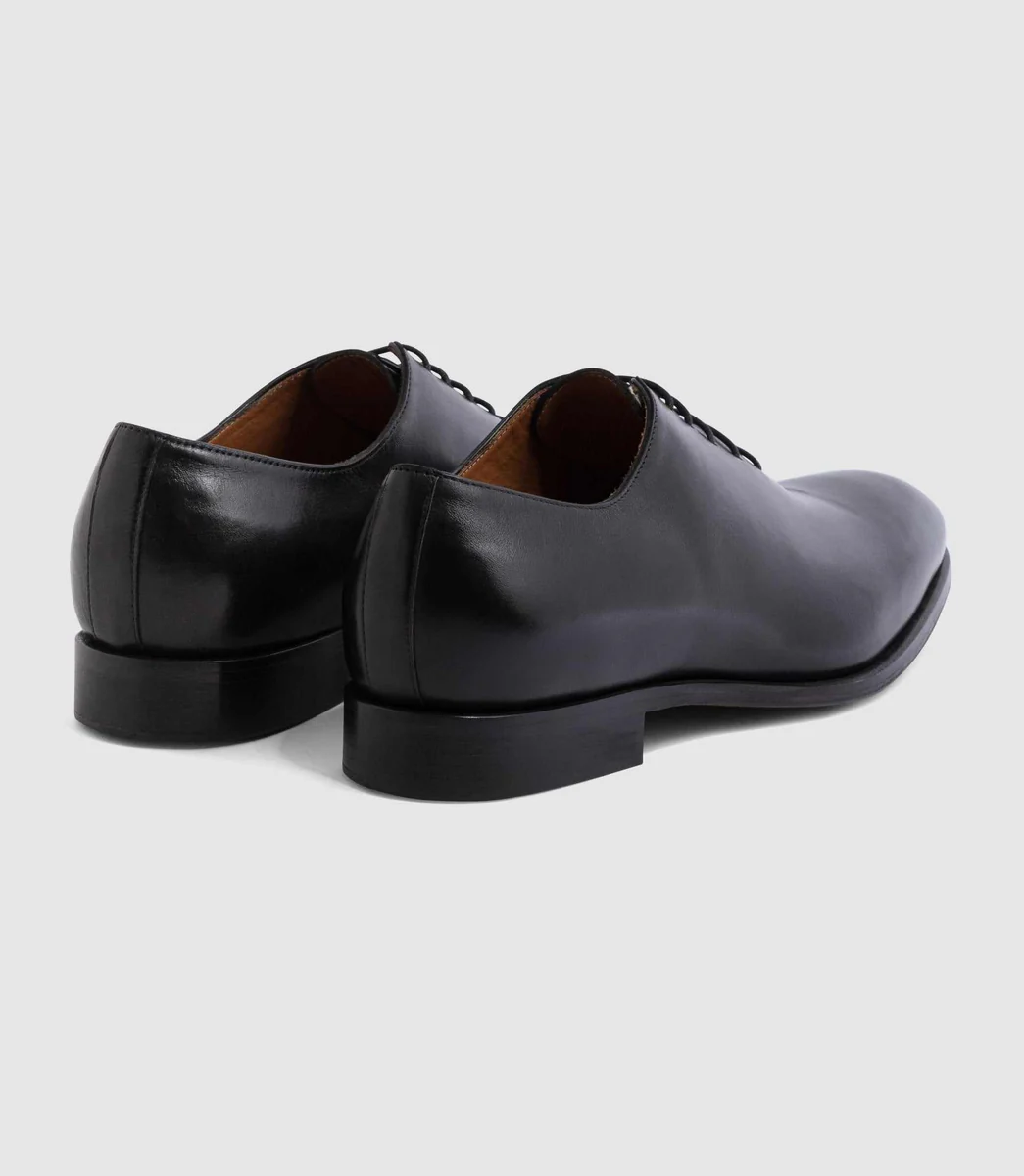 Chaussure coutures en cuir noir 