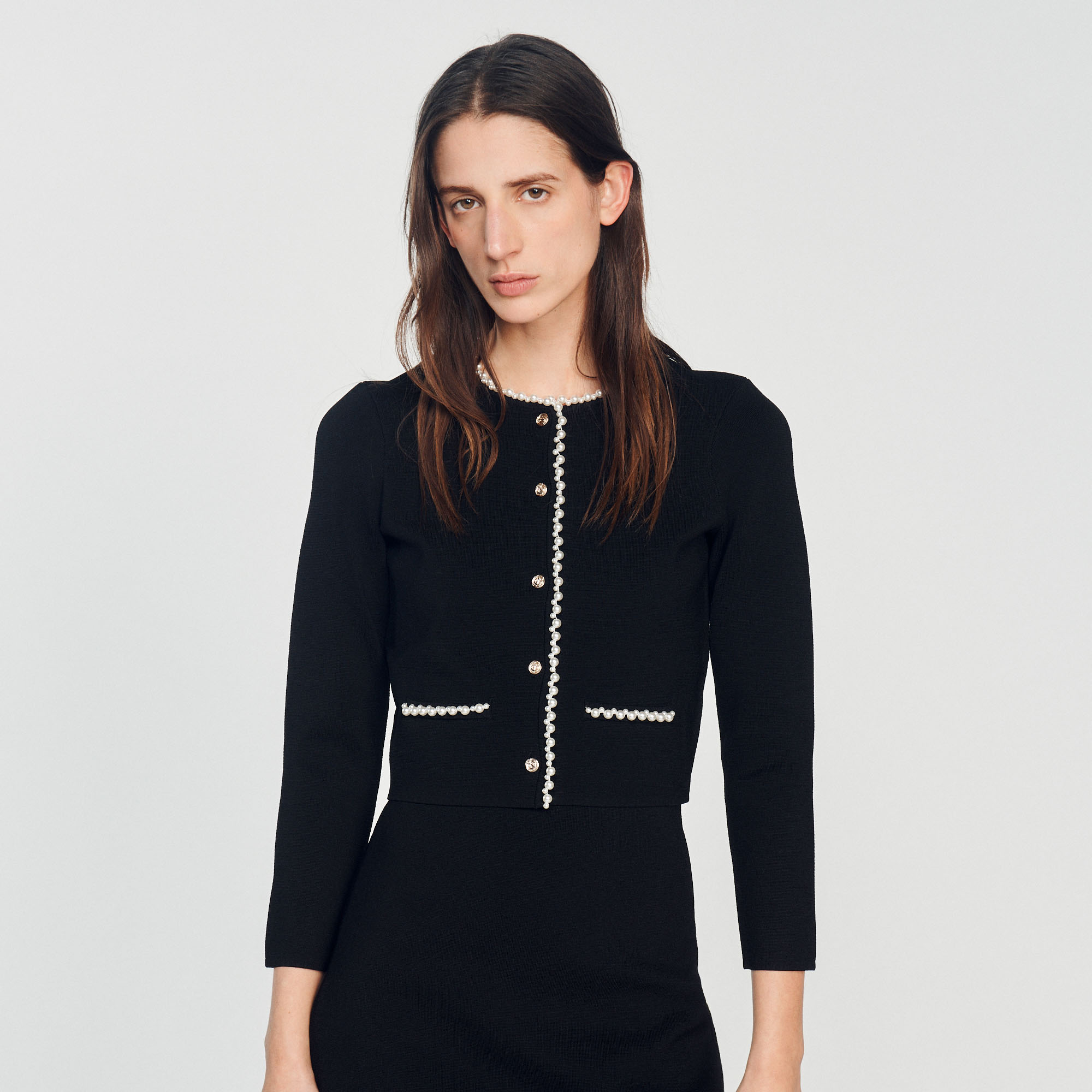 Veste ornee de perles