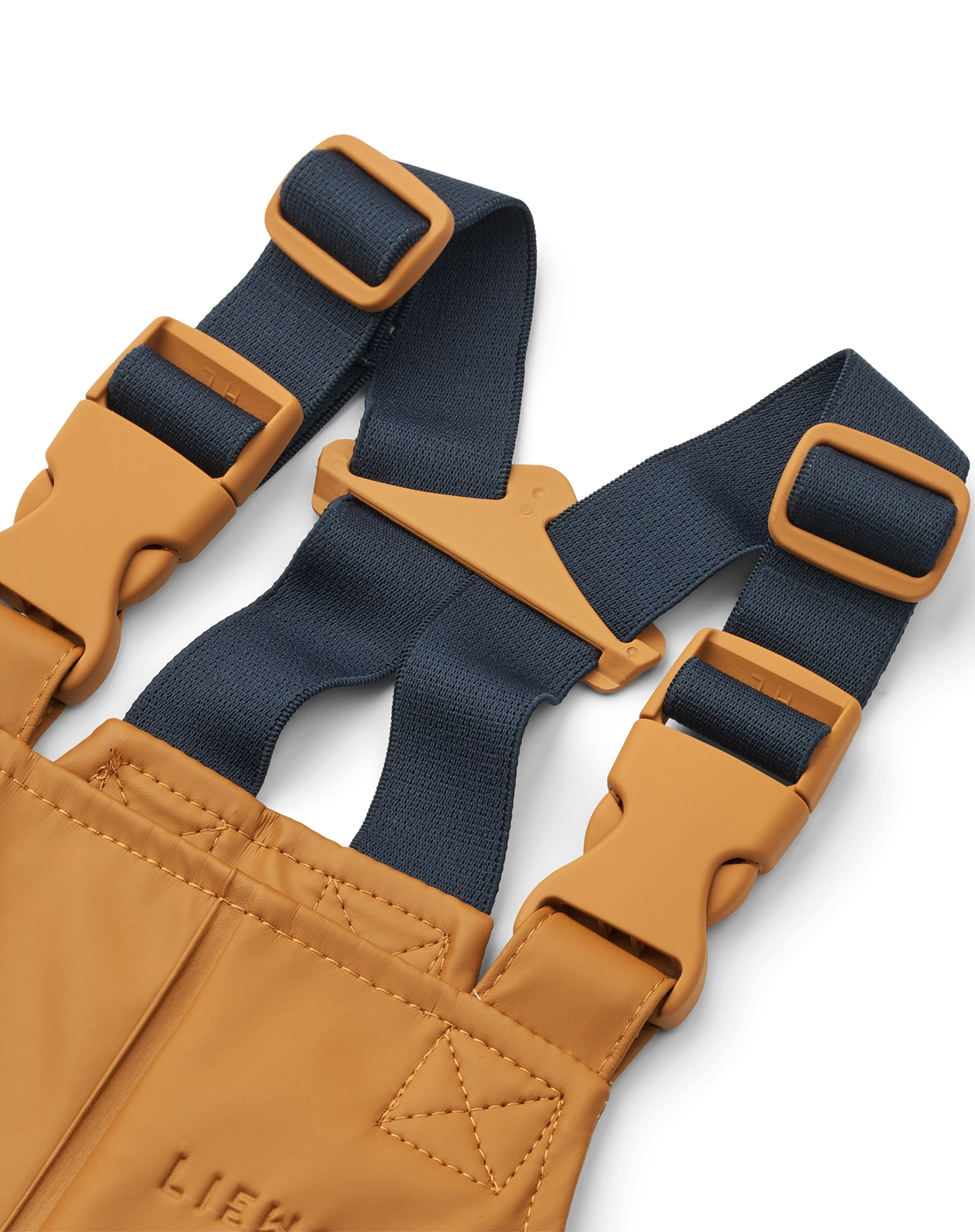Regenhose MELODI mit Trägern in golden caramel