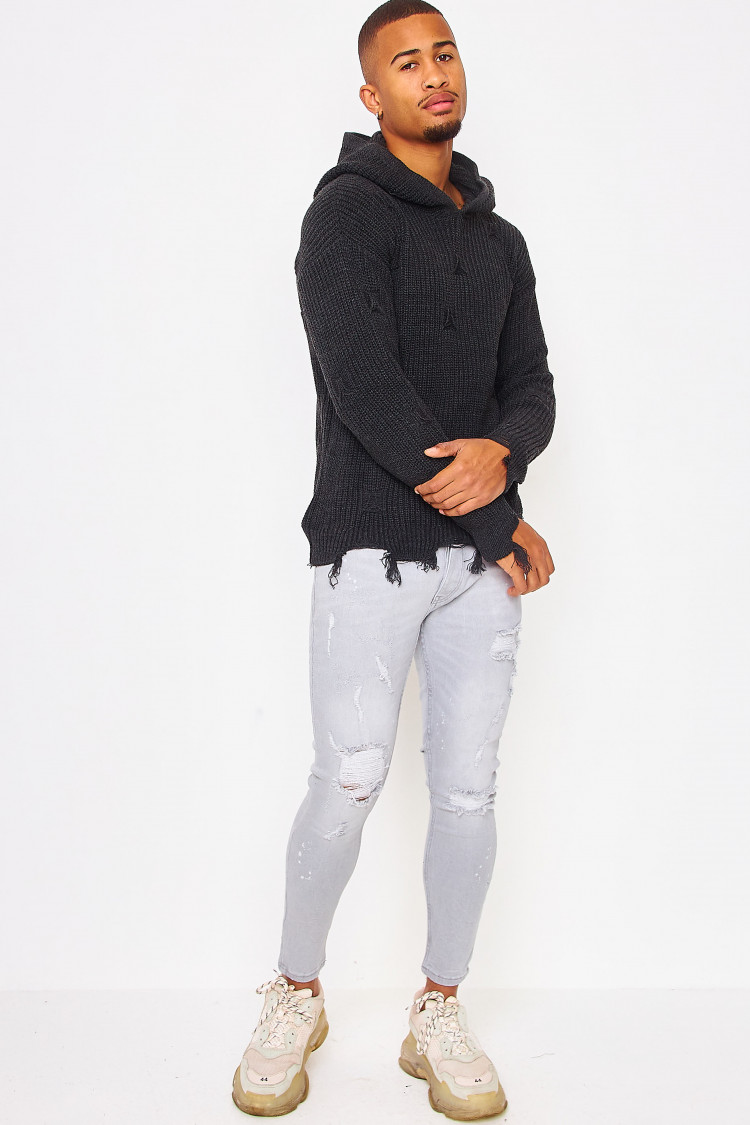 Pull à capuche gris foncé en maille déchiré aux extrémités