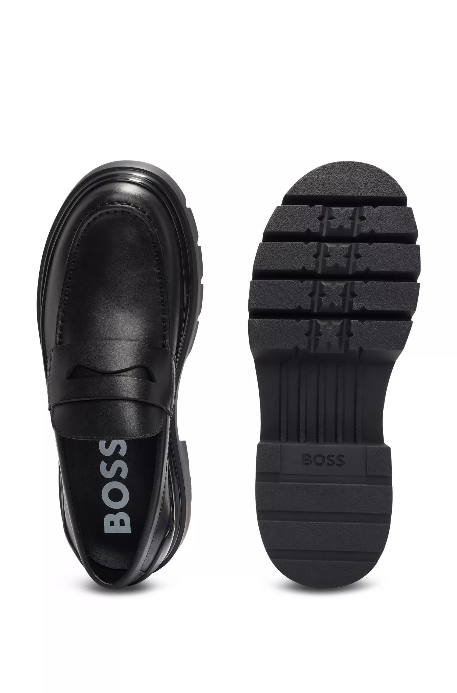 Mocassins BOSS em couro preto com sola de borracha robusta e palmilha removível.