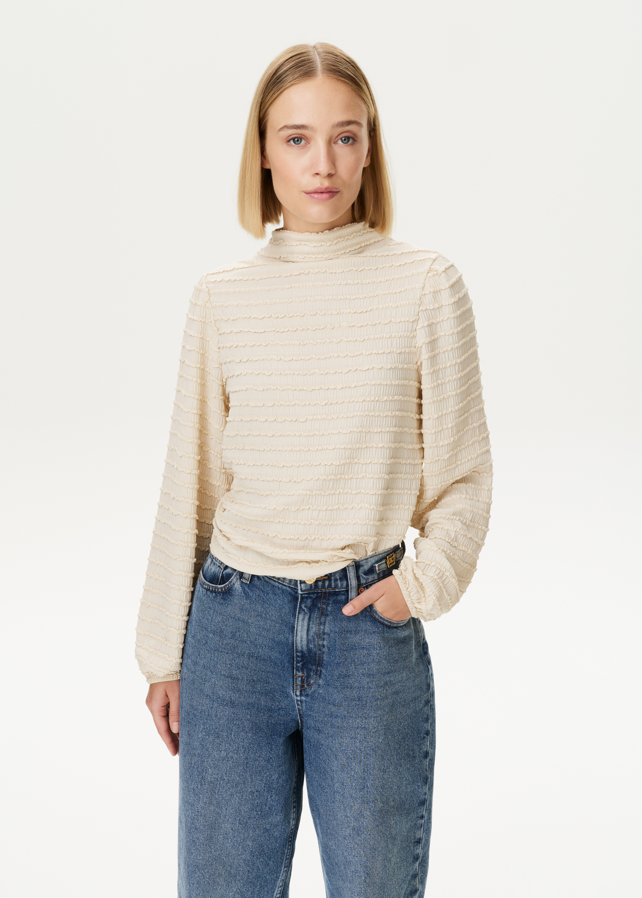 Top met ruffle structuur