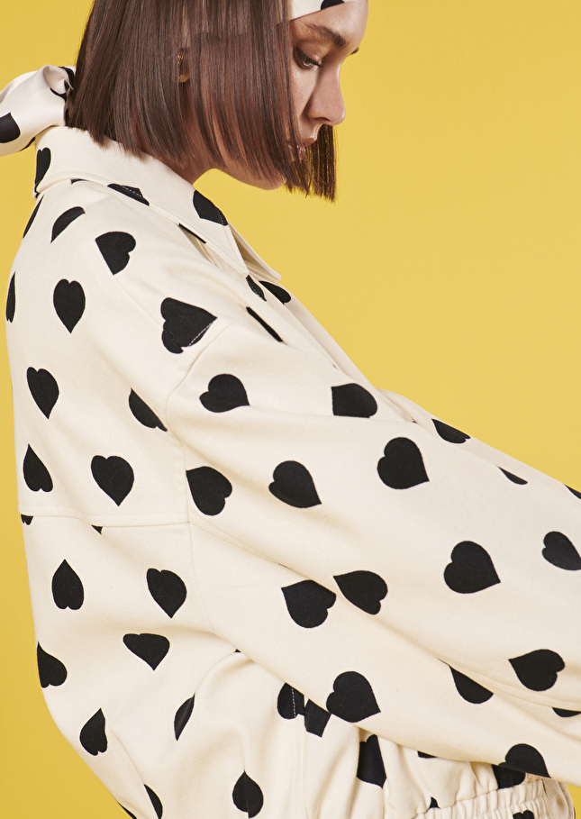 Blouson Bobbyécru à motif coeur noir