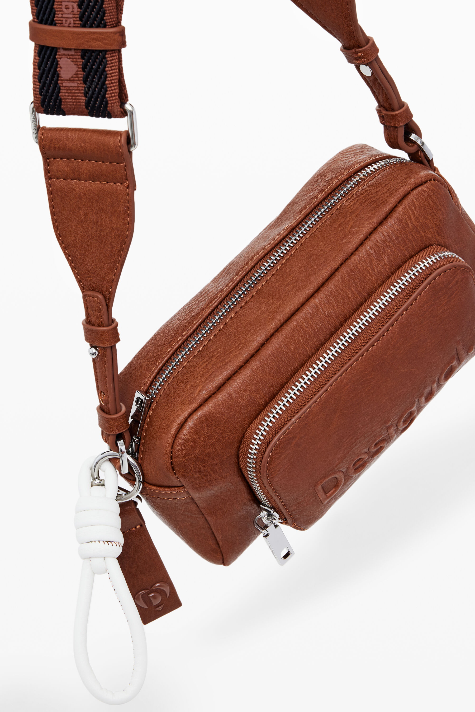 Bolsa transversal com vários bolsos