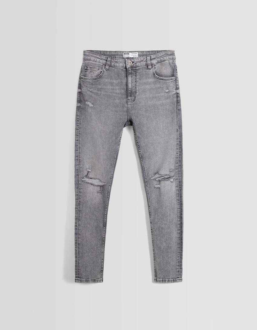 Calça jeans skinny rasgada