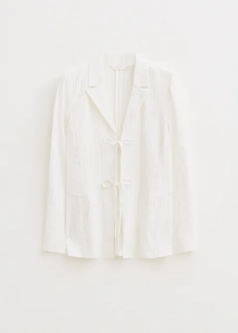 Blouse met structuur en strikjes off-white (WIT.O)