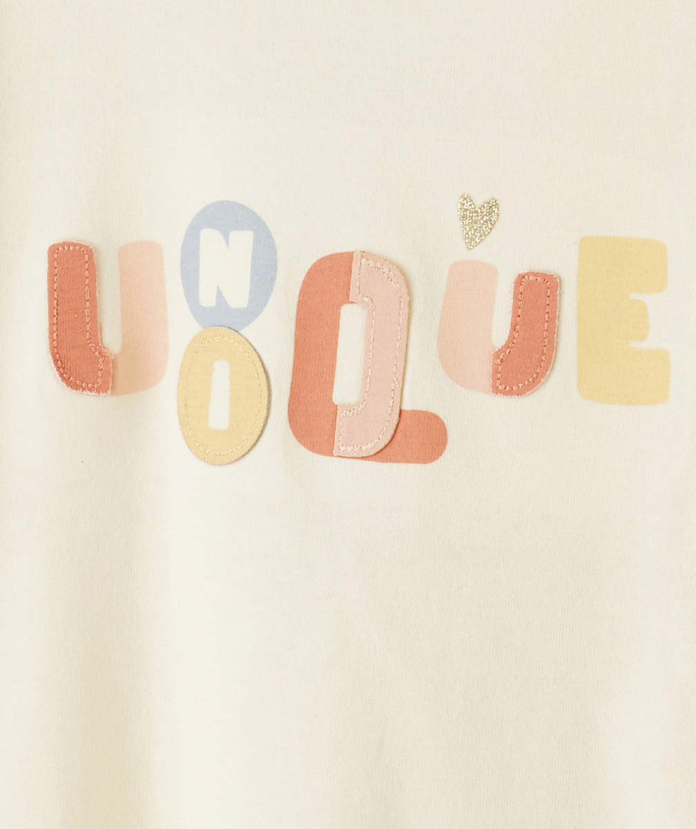 T-SHIRT BÉBÉ FILLE EN COTON BIO ÉCRU AVEC MESSAGE COLORÉ